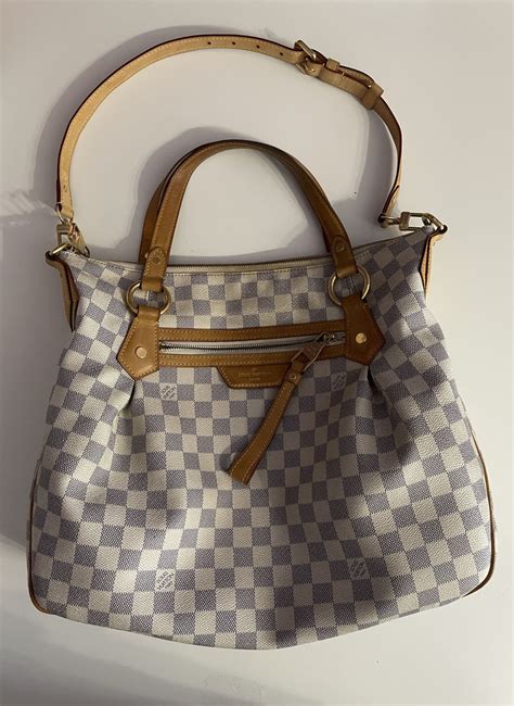 geanta lui louis vuitton original.